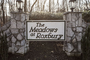 Neighborhood sign for The Meadows at Roxbury Condos in Ledgewood, Morris County, NJ